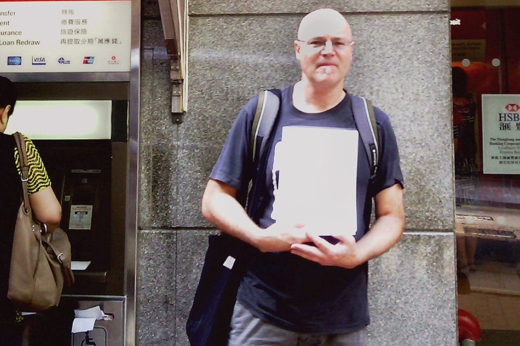 Robert Lewis was forced to make a return trip from his native Australia to Hong Kong to get access to his account.
