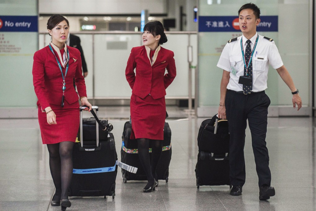 The new law will protect flight attendants on Hong Kong aircraft even when they are outside the city.