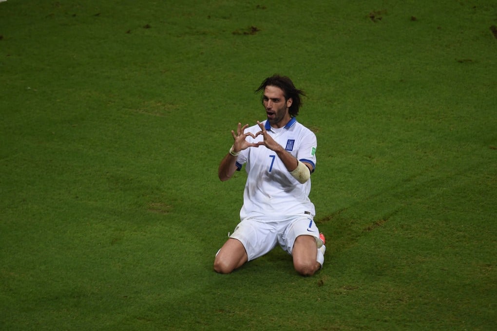 Georgios Samaras celebrates the winner. Photo: AFP