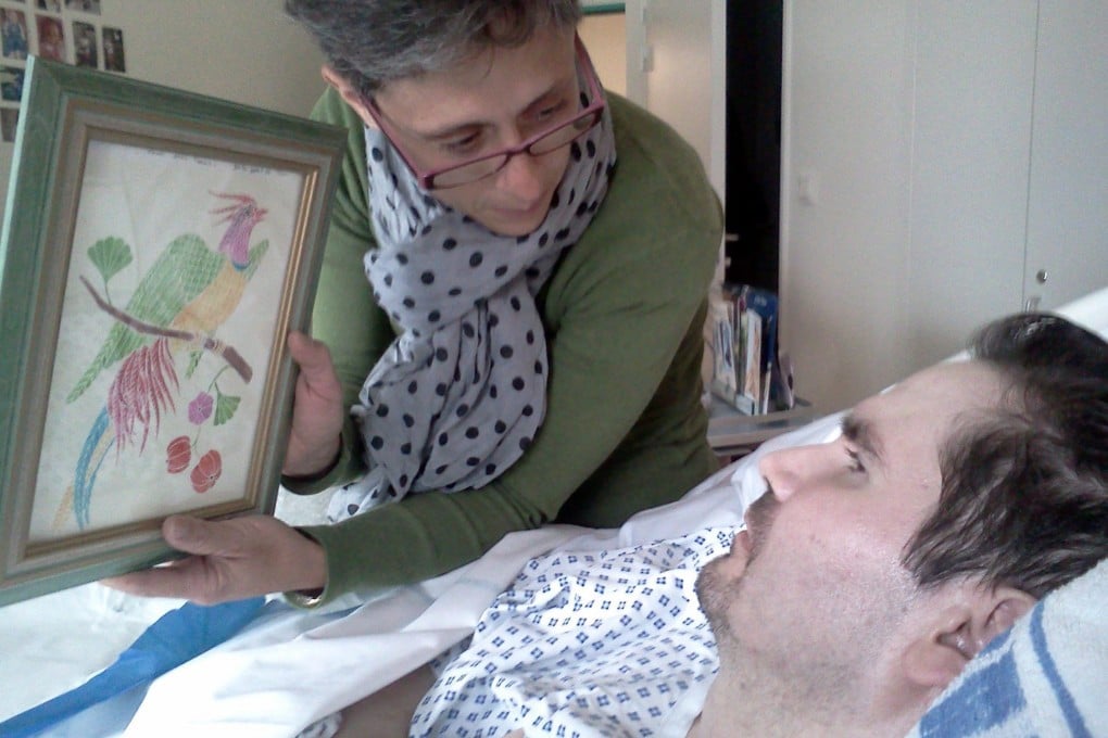 Vincent Lambert (right) and his mother at the hospital in France. Photo: EPA