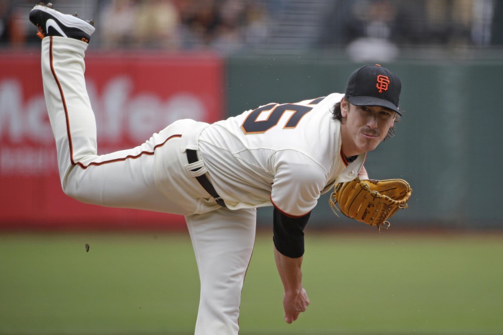 Giants starting pitcher Tim Lincecum, who threw his second career no-hitter, watches a delivery to a San Diego Padres player. Photo: AP