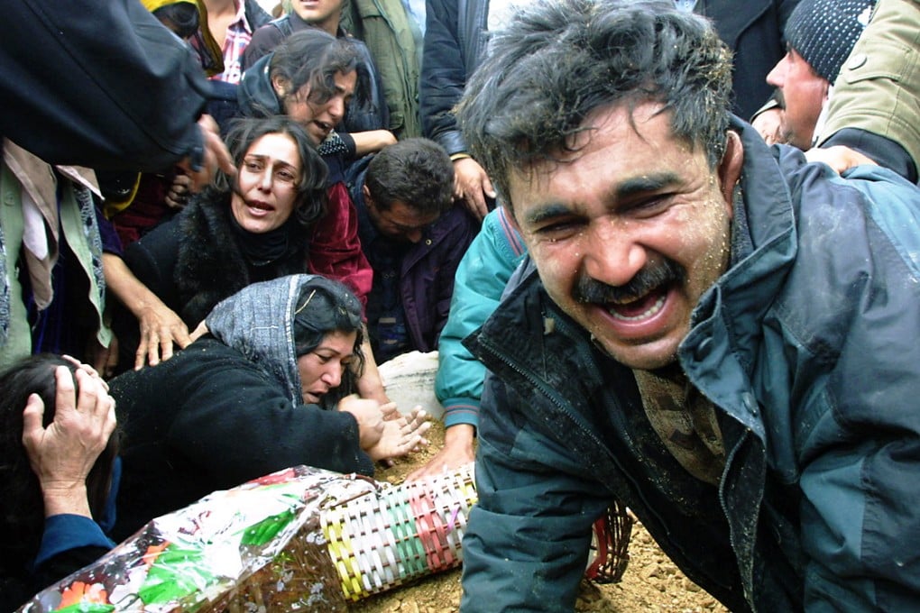 Mourners at the funeral of an assassinated Kurdish leader. Photo: AFP