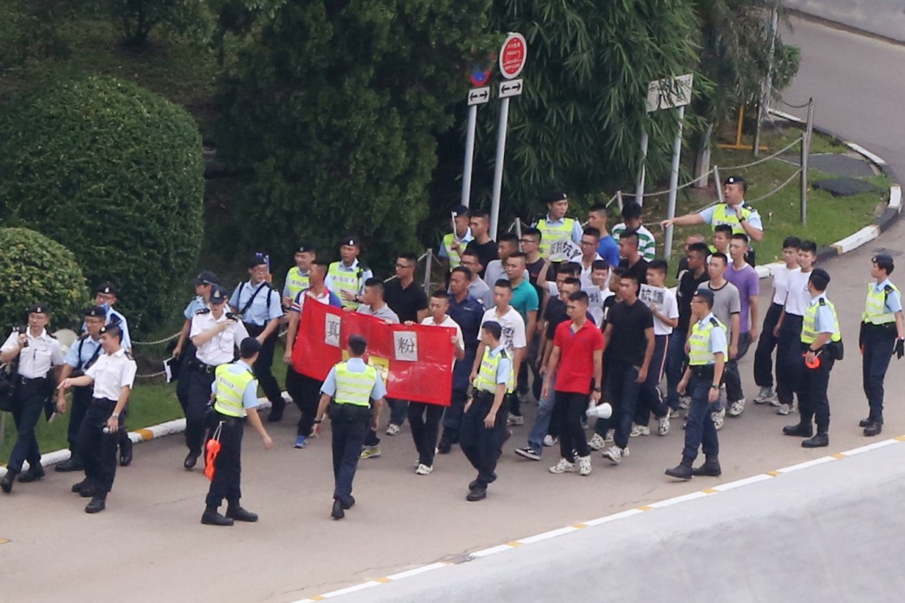 Police officers drill on Occupy Central at Hong Kong Police College in Wong Chuk Hang.