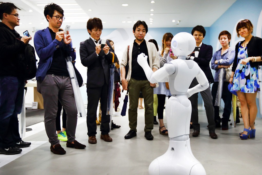 You can have Pepper, said to be the world's first humanoid robot who can read people's emotions, for the price of 198,000 yen. Photo: Bloomberg
