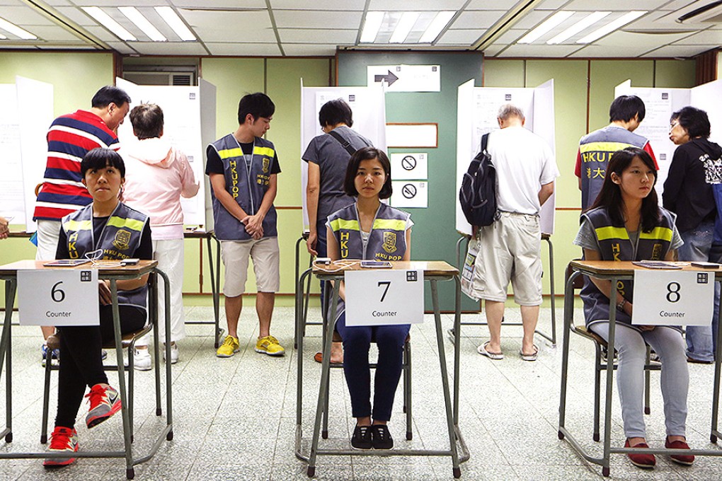 People vote in Hong Kong's unofficial referendum on democratic reform. Photo: AP