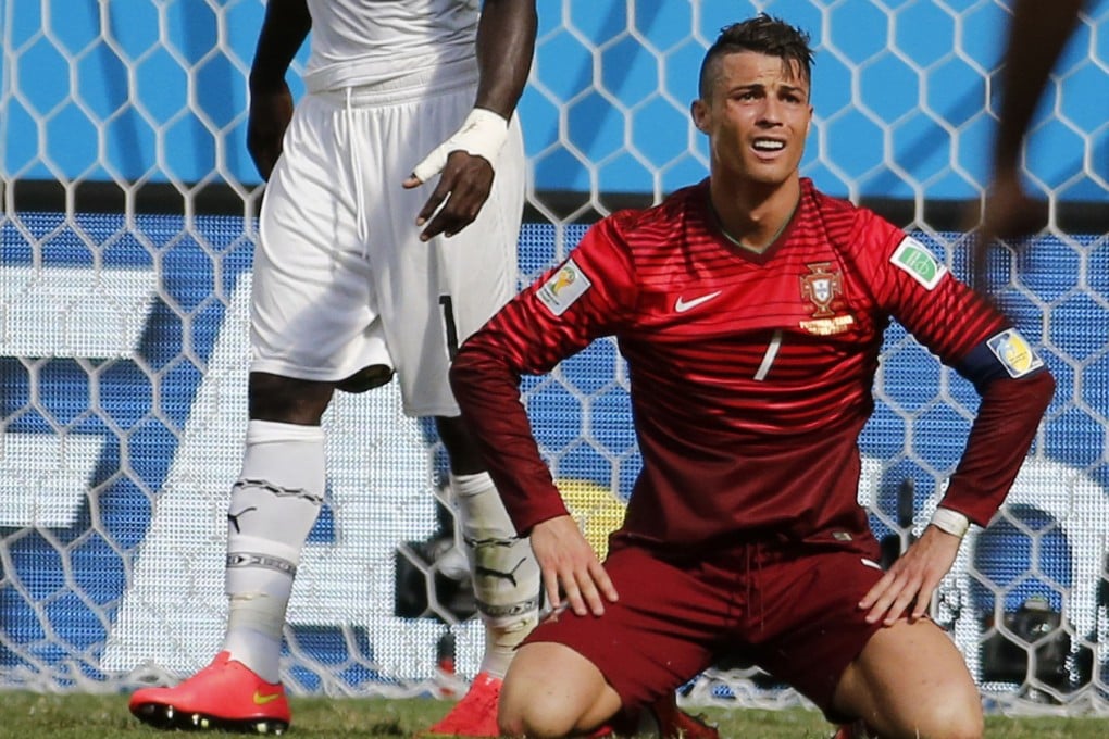 Cristiano Ronaldo slumps to his knees. Photo: Reuters