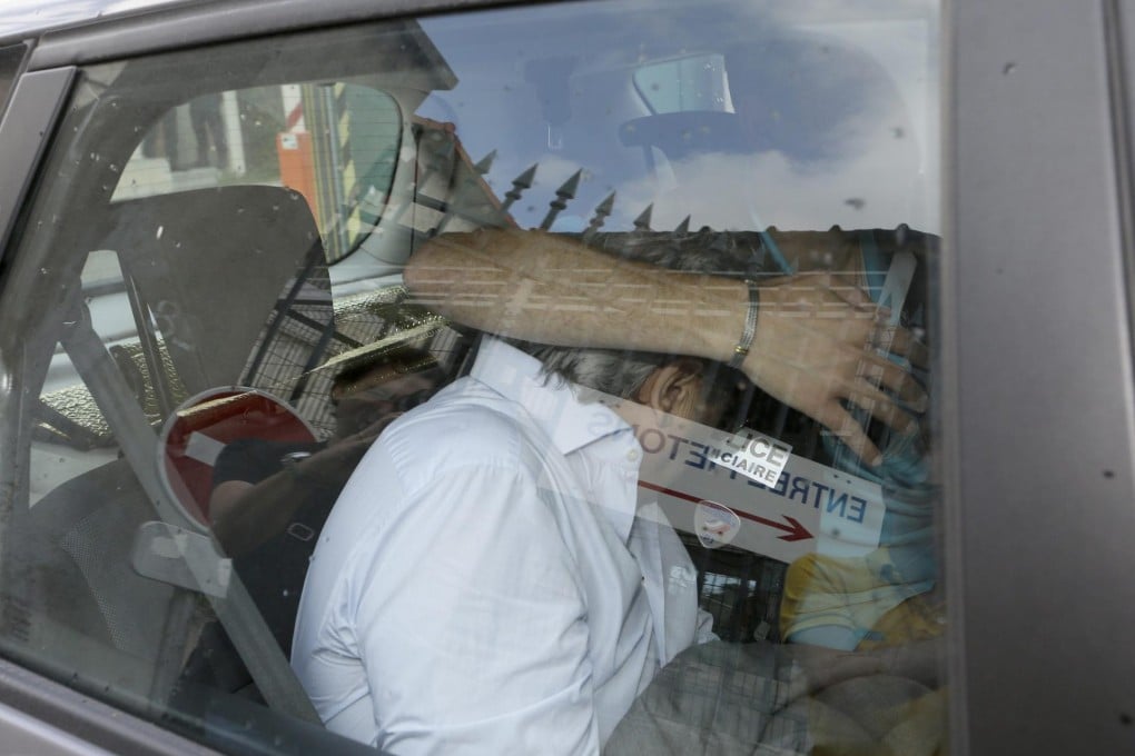 Wojciech Janowski leaves a police station. Photo: EPA