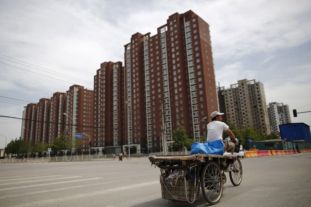 China's economic growth had slowed to the least in more than a decade even as companies increased debt to US$14.2 trillion by December 31. Photo: Reuters