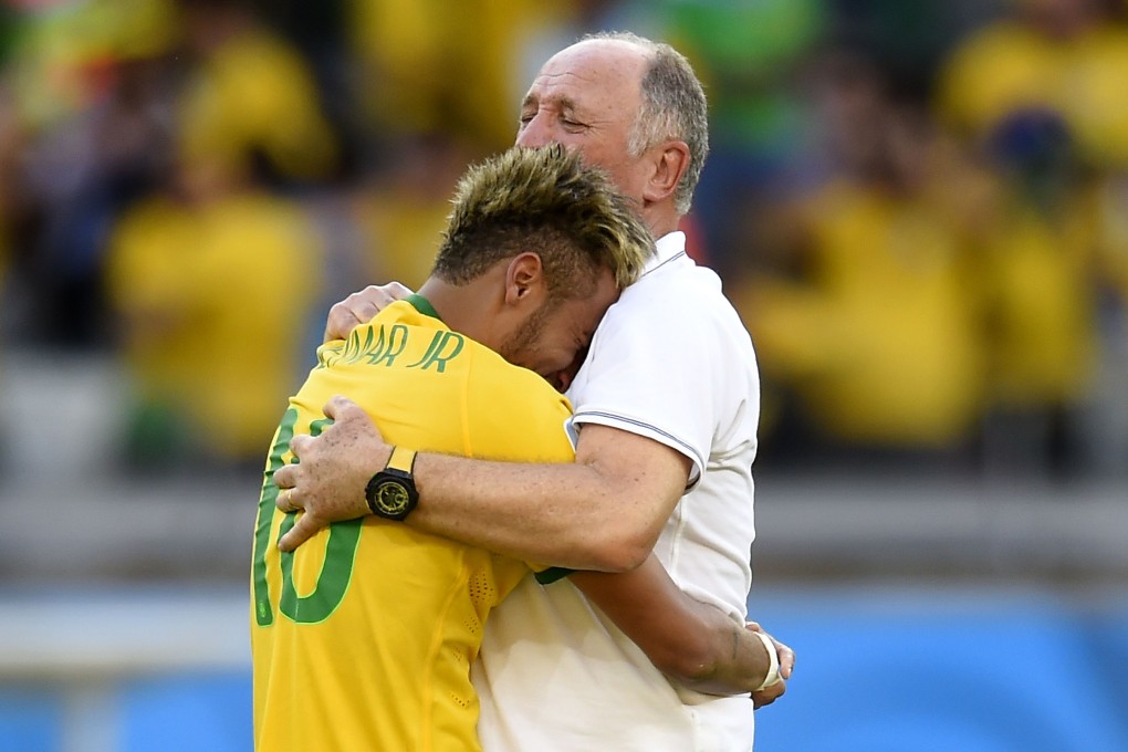 Scolari hugs Neymar after the shoot-out. Photo: AFP