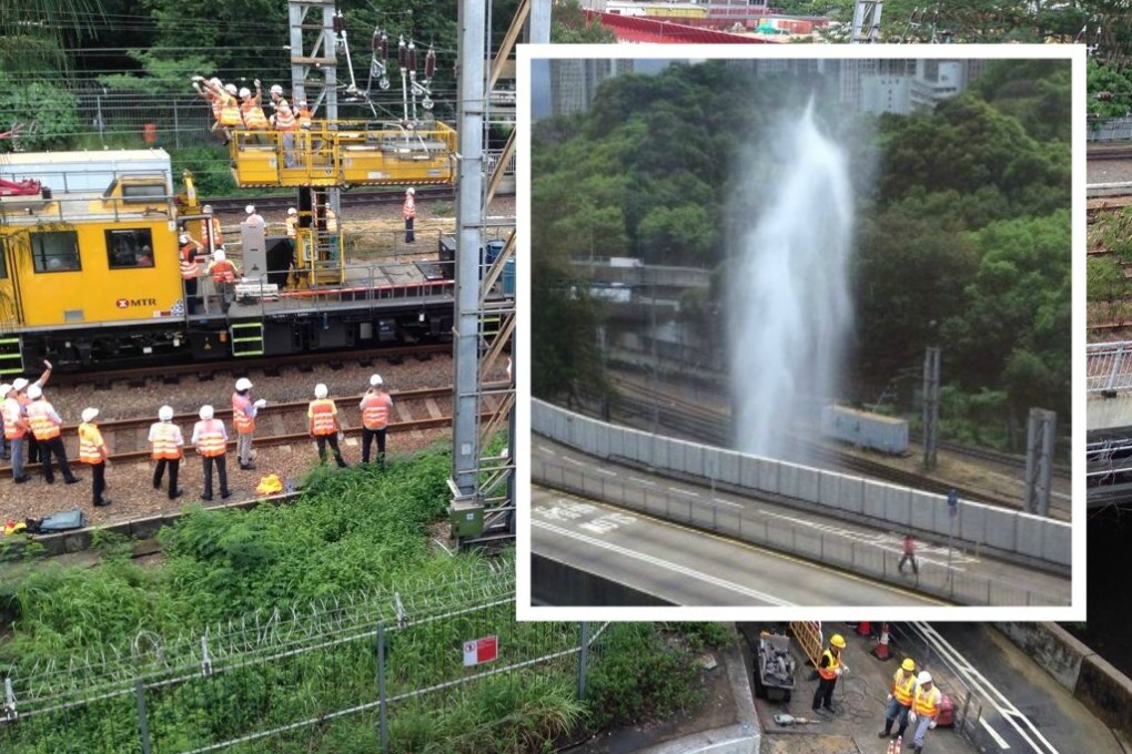 A burst pipe sent water shooting up over the train tracks, damaging overhead cables. Photos: Johnny Tam/Ken Cheung/Oriental Daily