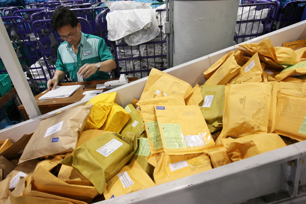 Staff at Chek Lap Kok airport's air mail centre found a damaged parcel from the United States that they suspected contained ammunition, leading to investigation of the case.