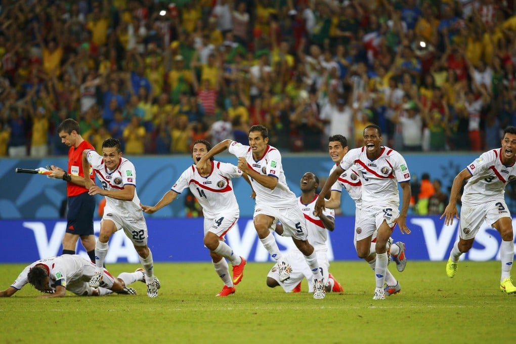 Costa Rica celebrate at the end of the shoot-out. Photo: Reuters