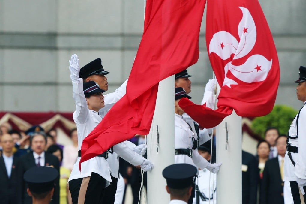 A crowd gathers at the flag-raising ceremony at Golden Bauhinia Square. Photo: K. Y. Cheng