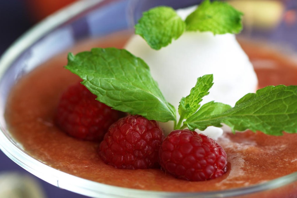 Champagne sorbet with saturn peach and raspberry purée. Photo: Jonathan Wong
