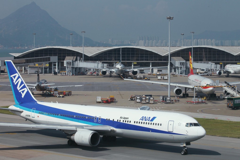 Airport's third runway could prove costly. Photo: Nora Tam