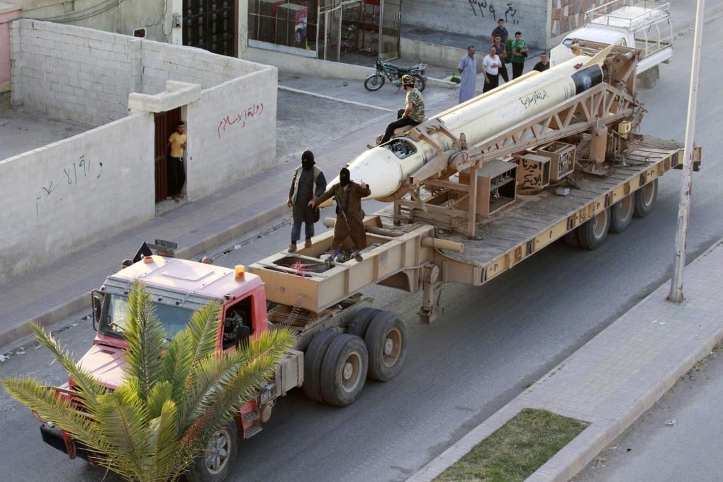 What appears to be a Scud missile is on display. Photo: Reuters