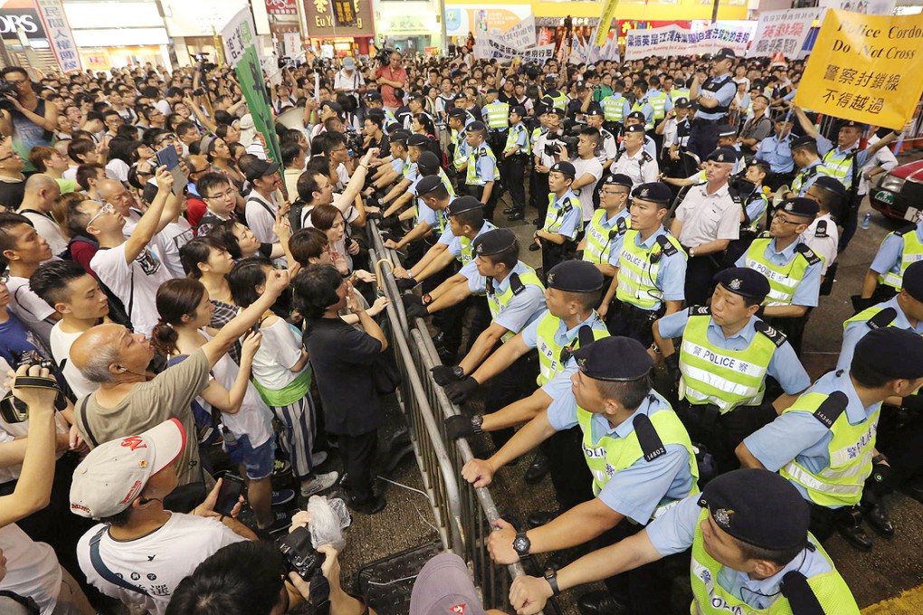 Marchers from all walks of life braved the heat - and rain - of summer to join the protest. Photo: Felix Wong