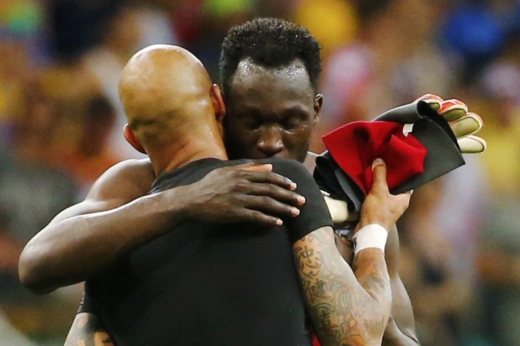 Tim Howard and Romelu Lukaku hug after the game. Photo: Reuters