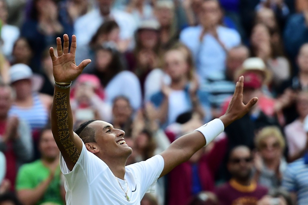 Australia's Nick Kyrgios soaks in the applause after stunning world number one Rafael Nadal. Photo: AFP