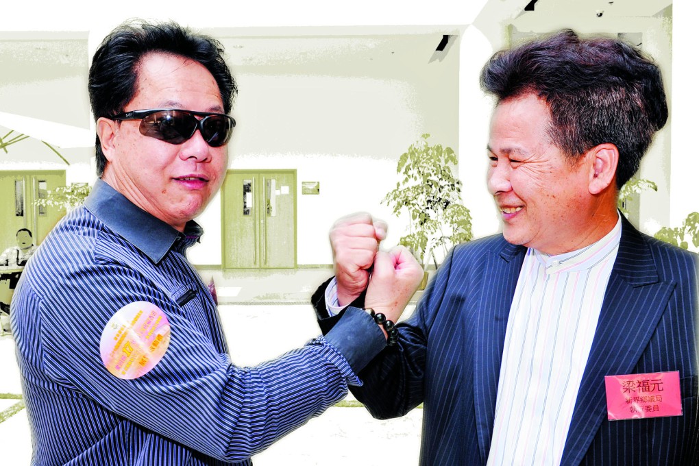 Chairman of the Sheung Shui Rural Committee Hau Chi-keung (left) with Tai Tong village chief Leung Fuk-yuen. Photo: Bruce Yan