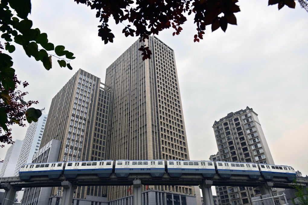 Many mainland developers have already announced 10 to 20 per cent increases in contracted sales for this year after a stellar performance last year, but found conditions tough in the second quarter. Photo: AFP