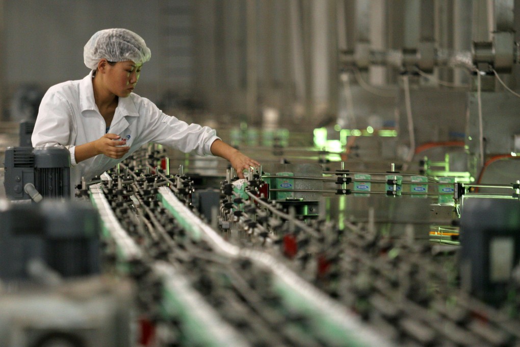 Yili and other large domestic dairy producers are expanding overseas to ensure they get a safe and stable milk supply amid increased demand. Photo: Bloomberg
