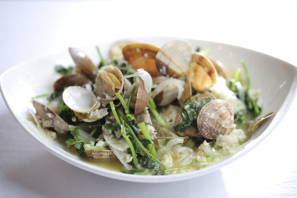 SHELL OUT: clams with white wine and lemon sauce at Albergue 1601. Photos:  Paul Yeung