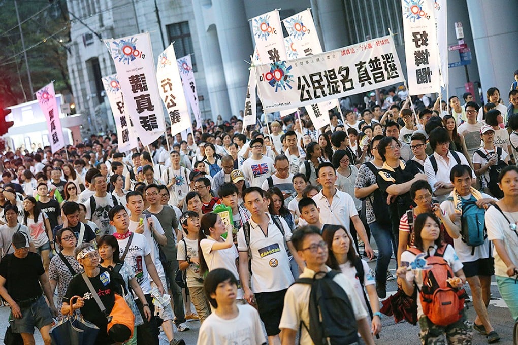 Protesters take to the streets on July 1. Photo: David Wong