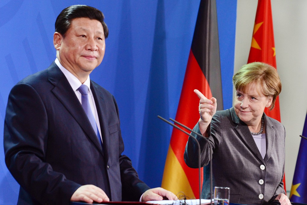 Xi Jinping and German Chancellor Angela Merkel during the president's visit to Berlin in March. Photo: AFP