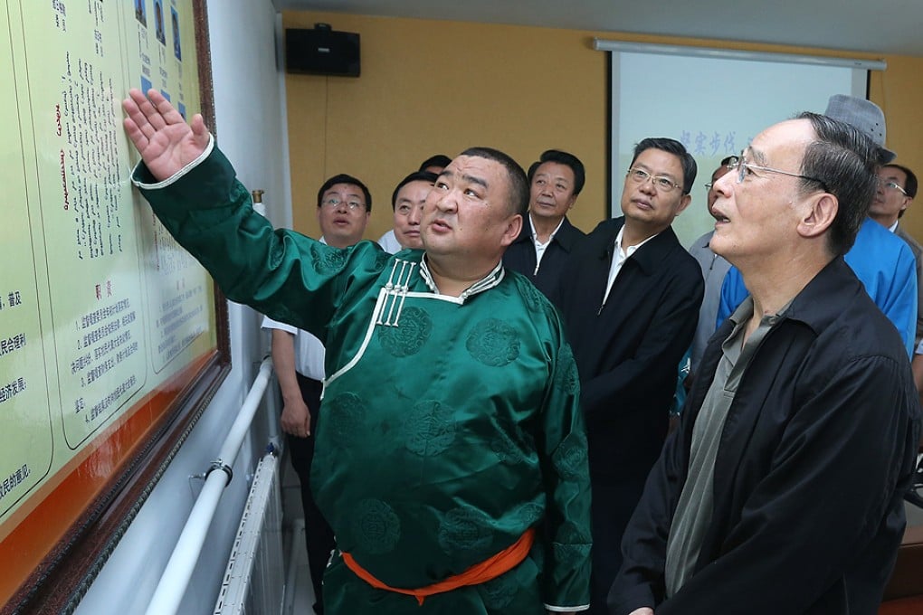 Wang Qishan (right), secretary of the Central Commission for Discipline Inspection, during a visit to the Inner Mongolia Autonomous Region on Friday. Photo: Xinhua