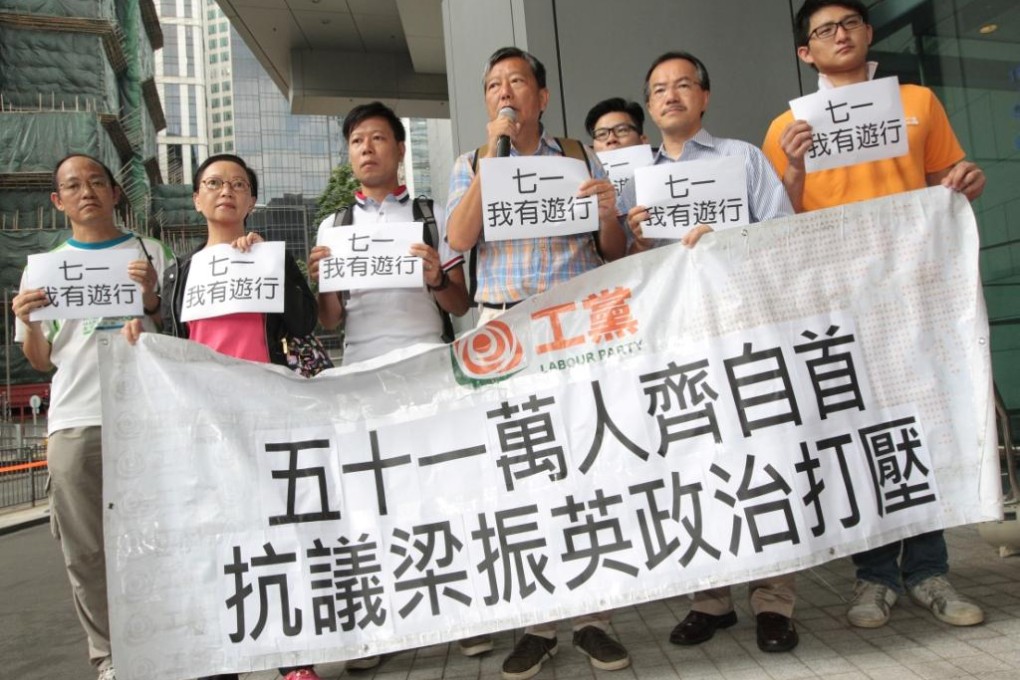 Members of Labour Party (from 2nd left) Cyd Ho Sau-lan, Tam Chun-yin, Lee Cheuk-yan, Kwok Wing-kin, Fernando Cheung Chiu-hung, and others surrender themselves to the police at the police headquarters in Wan Chai. Photo: Bruce Yan