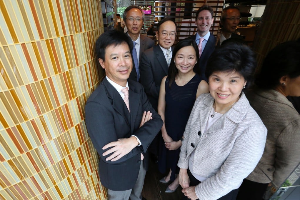 At the meeting of judges for the enterprise awards yesterday were (front, from left) Alex Cheung, Elsie Cheung, Ecila Chan, (back, from left) Cliff Chan, Liu Chee-ming and Nick Edwards. Photo: Nora Tam