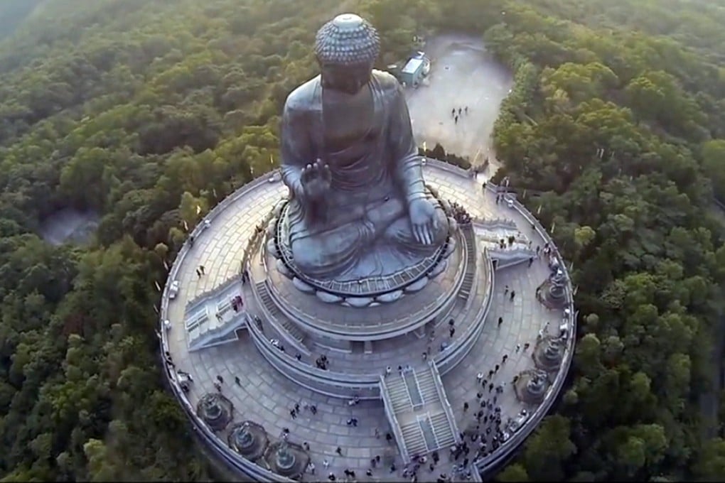 A camera on board an airborne drone has captured this unique view of the Big Buddha on Lantau Island. Photo: SCMP