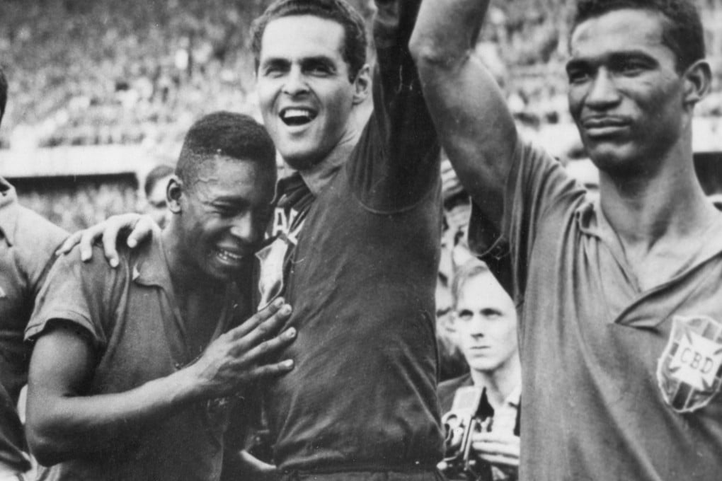 Brazil's 17-year-old Pele weeps on the shoulder of goalkeeper Gilmar Dos Santos Neves, along with Didi at the 1958 World Cup.