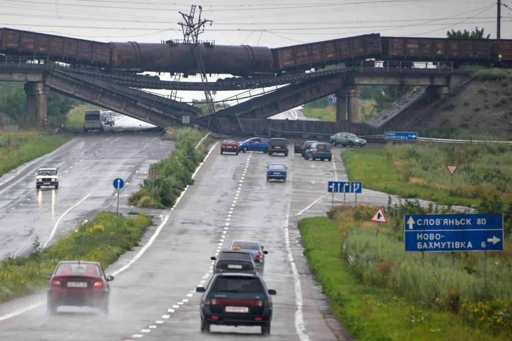 Donetsk and Luhansk are considered potential targets after three bridges on roads leading to Donetsk were blown up on Monday. Photo: EPA