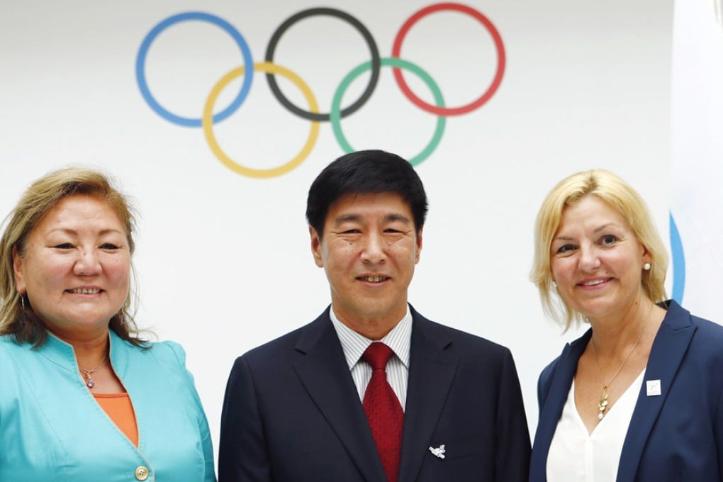 (From left) the Vice-Mayor of Almaty, Zauresh Amanzholovaat, Vice-Mayor of Beijing, Yang Xiaochao, and CEO of Oslo 2022, Eli Grimsby, pose at the IOC meeting. Photo: Reuters