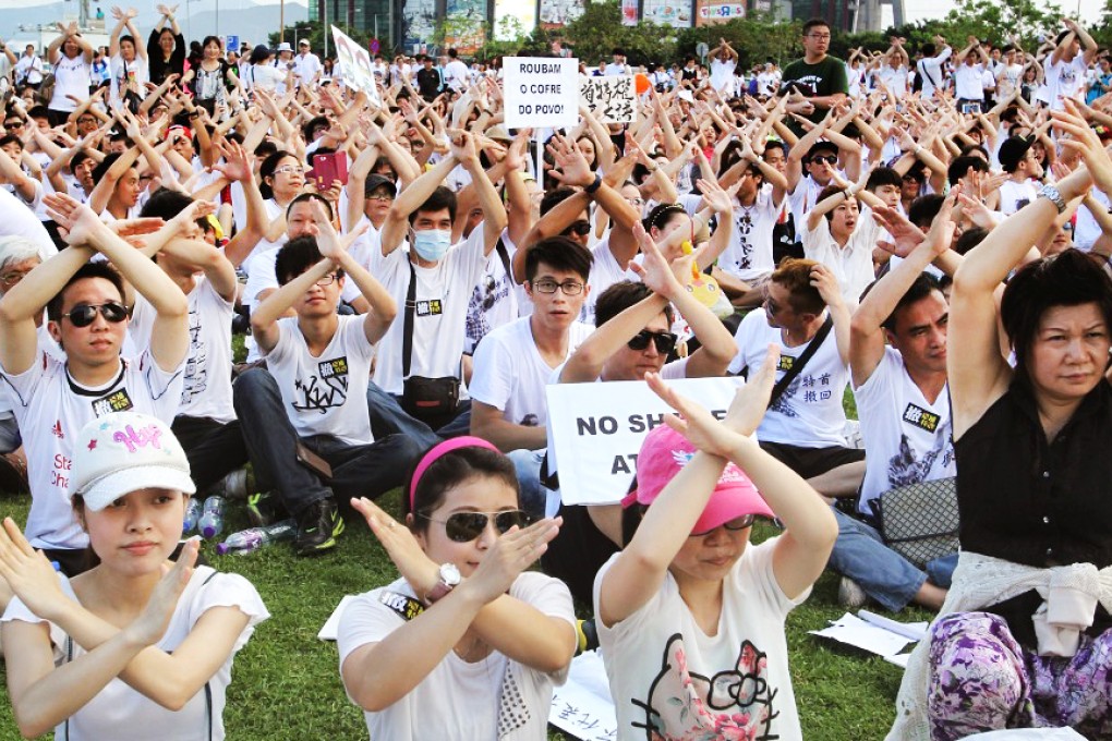 Some 20,000 people protested in Macau in May over retirement benefits for officials. Photo: Dickson Lee