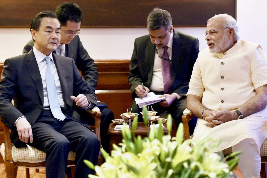 Foreign Minister Wang Yi talks with Indian Prime Minister Narendra Modi in New Delhi during a visit last month. Photo: AP