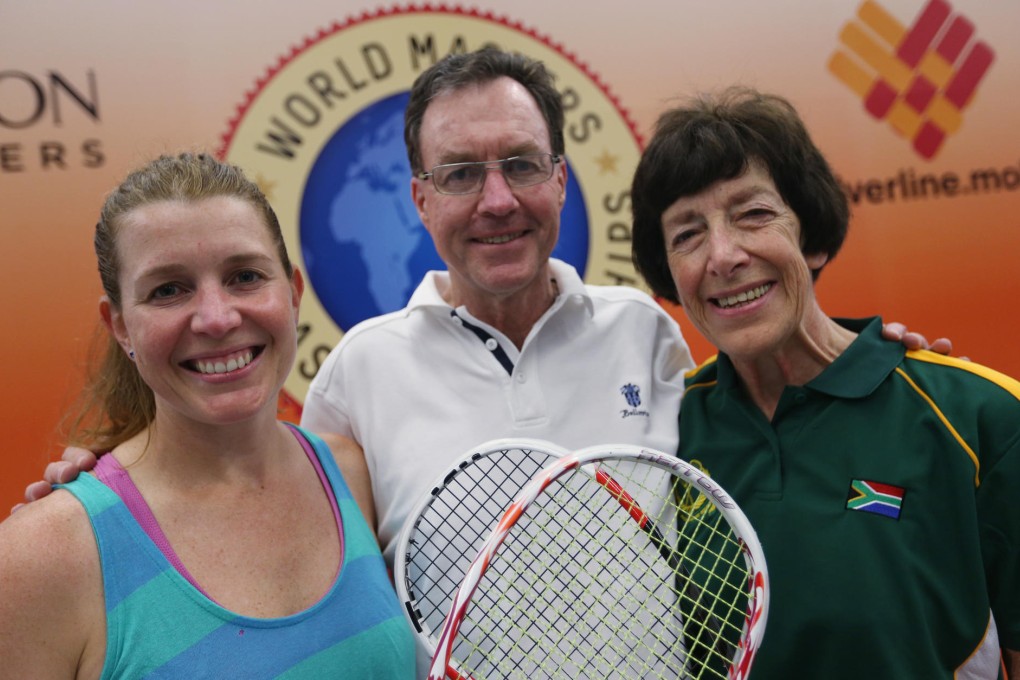 Former world No 1 Natalie Grainger with her parents, Chris and Jean, who are all playing in the World Masters Squash Championships. Chris lost his 65 or over semi 1-3 to Brian Cook. Photo: K.Y. Cheng