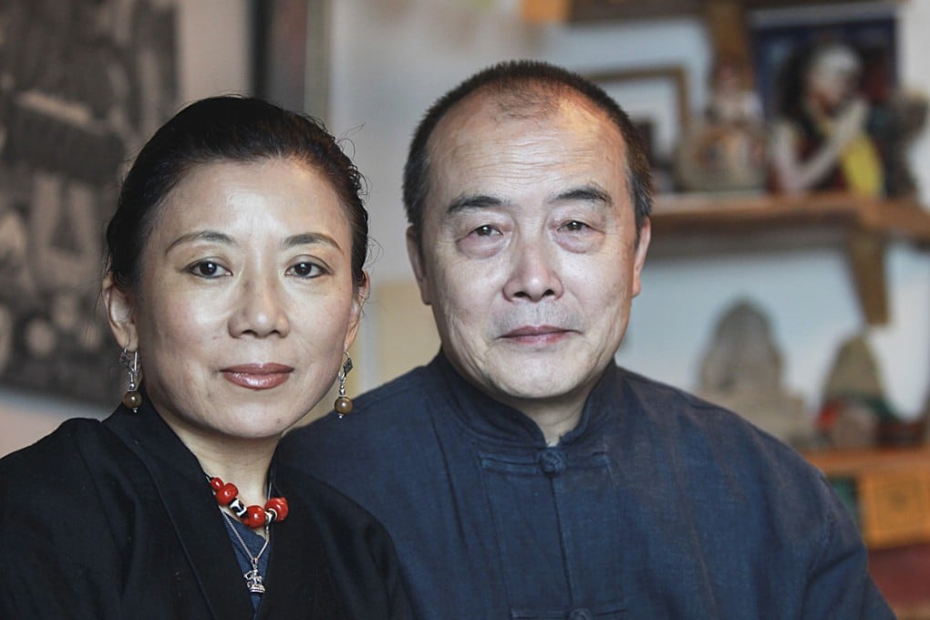 Tsering Woeser (left) and her husband Wang Lixiong at their home in Beijing. Photo: Simon Song