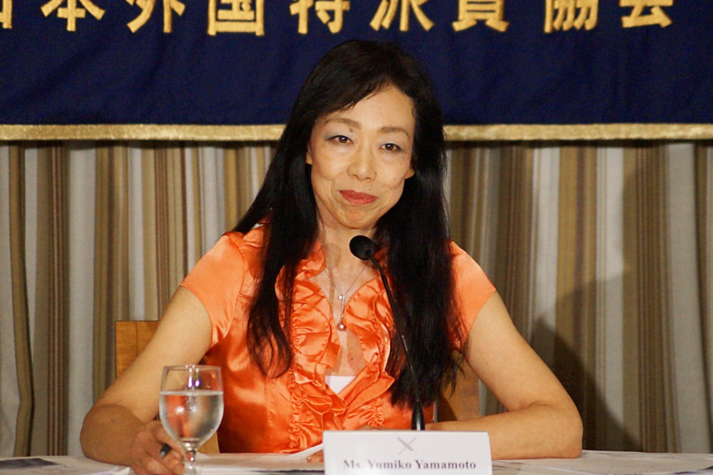 Yumiko Yamamoto gives a speech at the Foreign Correspondents’ Club of Japan on July 9. Photo: AP