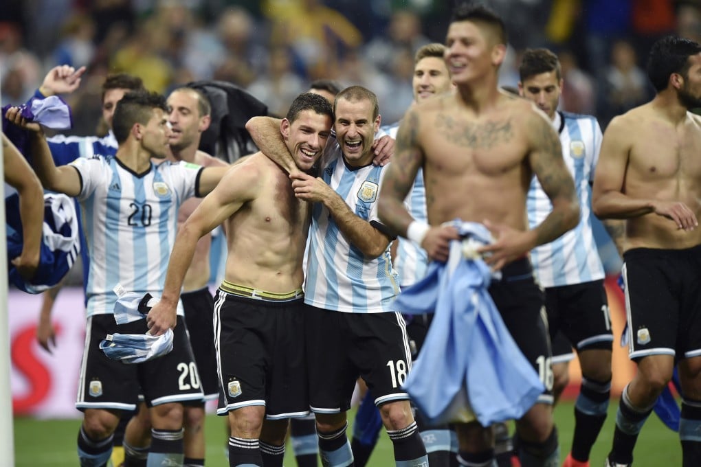 Argentina celebrate after reaching the final. Photo: AP