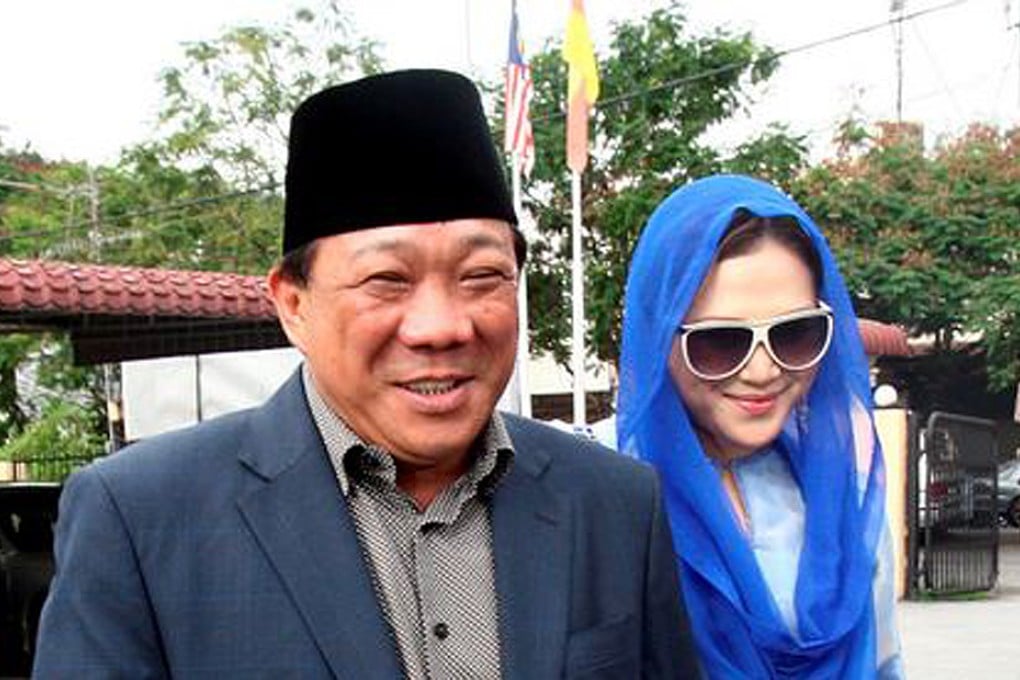 Malaysian lawmaker Bung Mokhtar Radin and his second wife Zizie Ezette in this file image from 2010. Photo: AFP