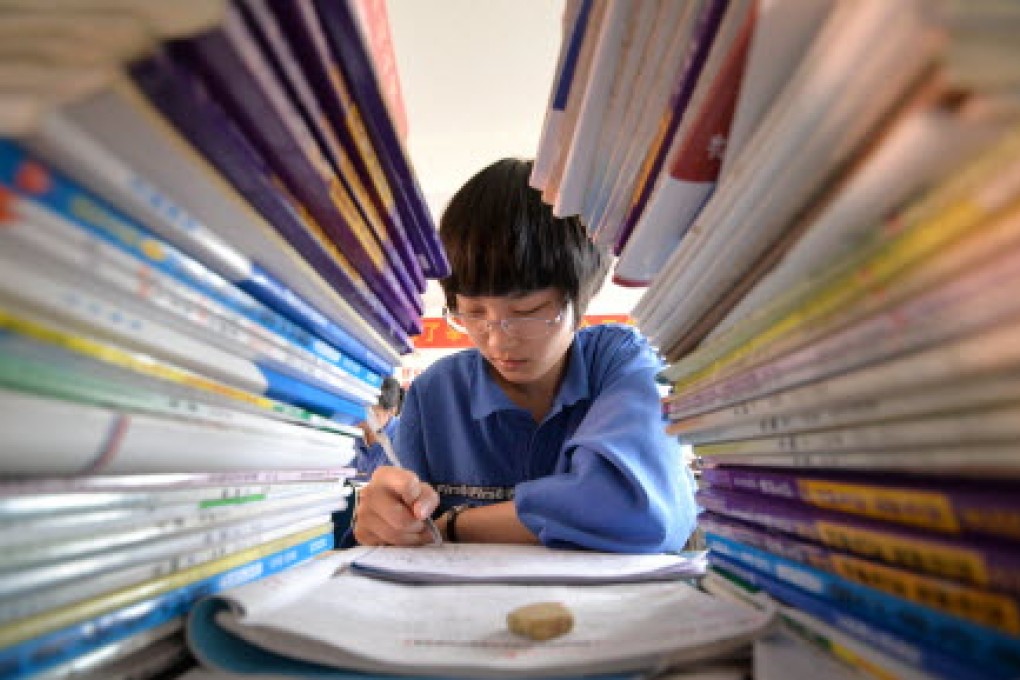 China leads the pack when it comes to the financial knowledge and skills of 15-year-old boys and girls, according to an international study. Photo: Xinhua