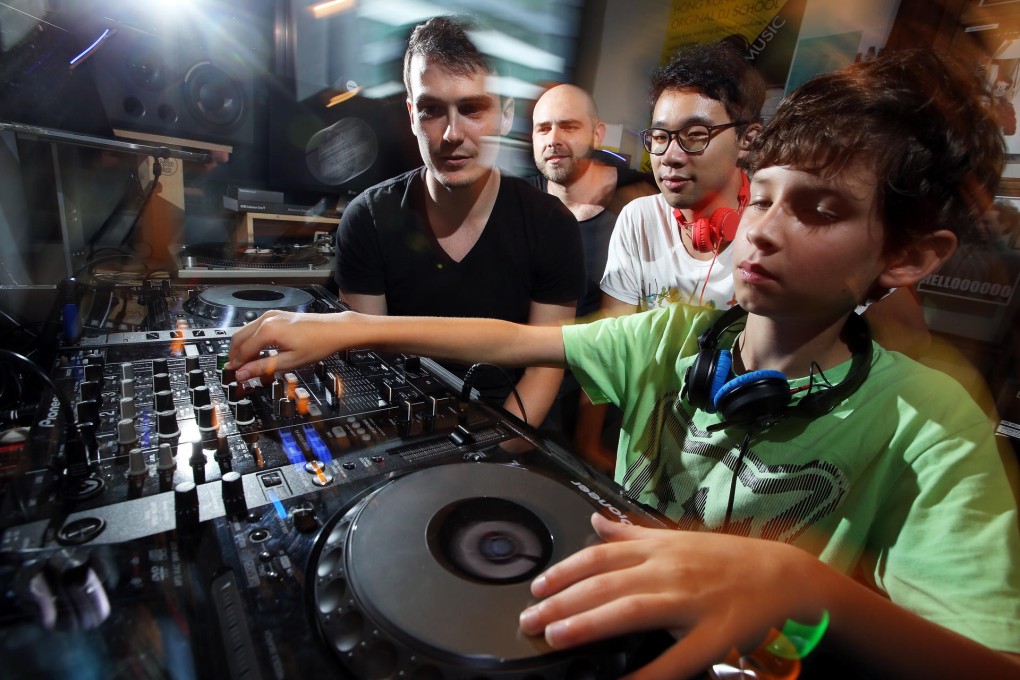 From left: Sol Passion Music founders Mike Vera and Ed Rollo with students Charles Lam Ka-ho and Aiden Dungey in the studio. Photo: Sam Tsang