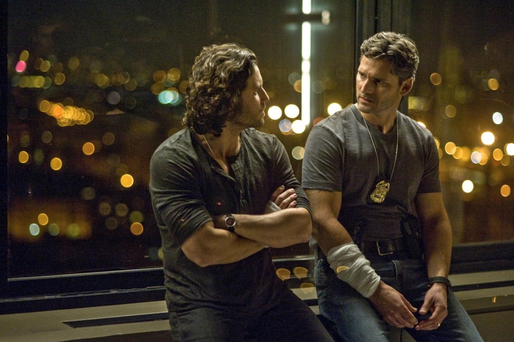 Edgar Ramirez and Eric Bana as a priest and a policeman in Deliver Us From Evil.