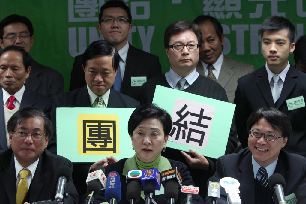 The Democratic Party stresses the Chinese term "unity" as chairwoman Emily Lau and other members discuss development in the northeastern New Territories. Photo: May Tse