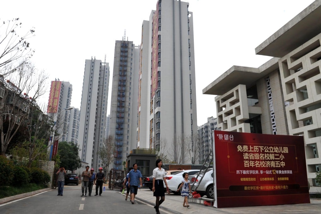 The government in Jinan started allowing residents to buy more homes from yesterday, regardless of how many they already own, or whether they are registered as residents. Photo: Xinhua