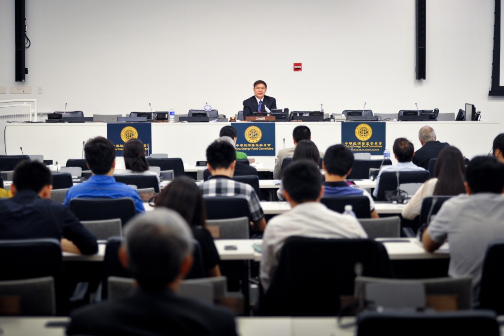 Pan Jiahua of the Institute for Urban and Environment Studies, CASS, addresses a forum in New York. People's Daily said scholars working for the think tank should be judged mainly on their loyalty to communist ideology. Photo: Xinhua
