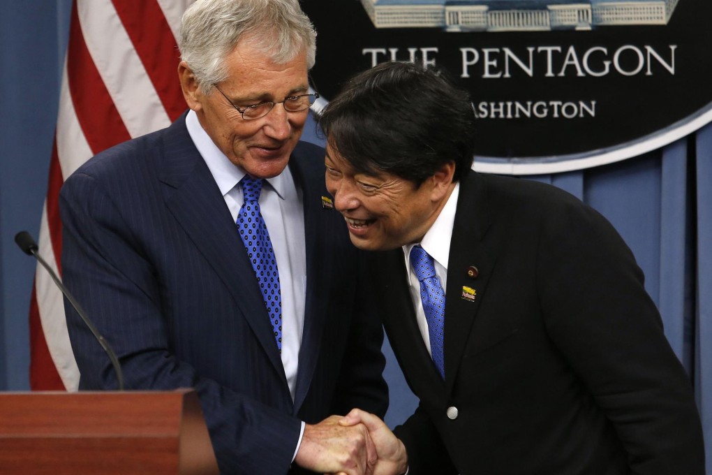 US Secretary of Defence Chuck Hagel (left) with Japan's defence minister, Itsunori Onodera, at the Pentagon on Friday. Photo: Reuters